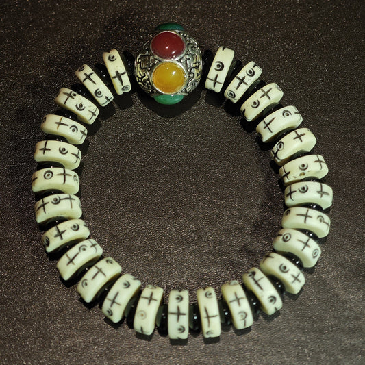 Tibetan Bone Bracelet with Symbolic Inlays